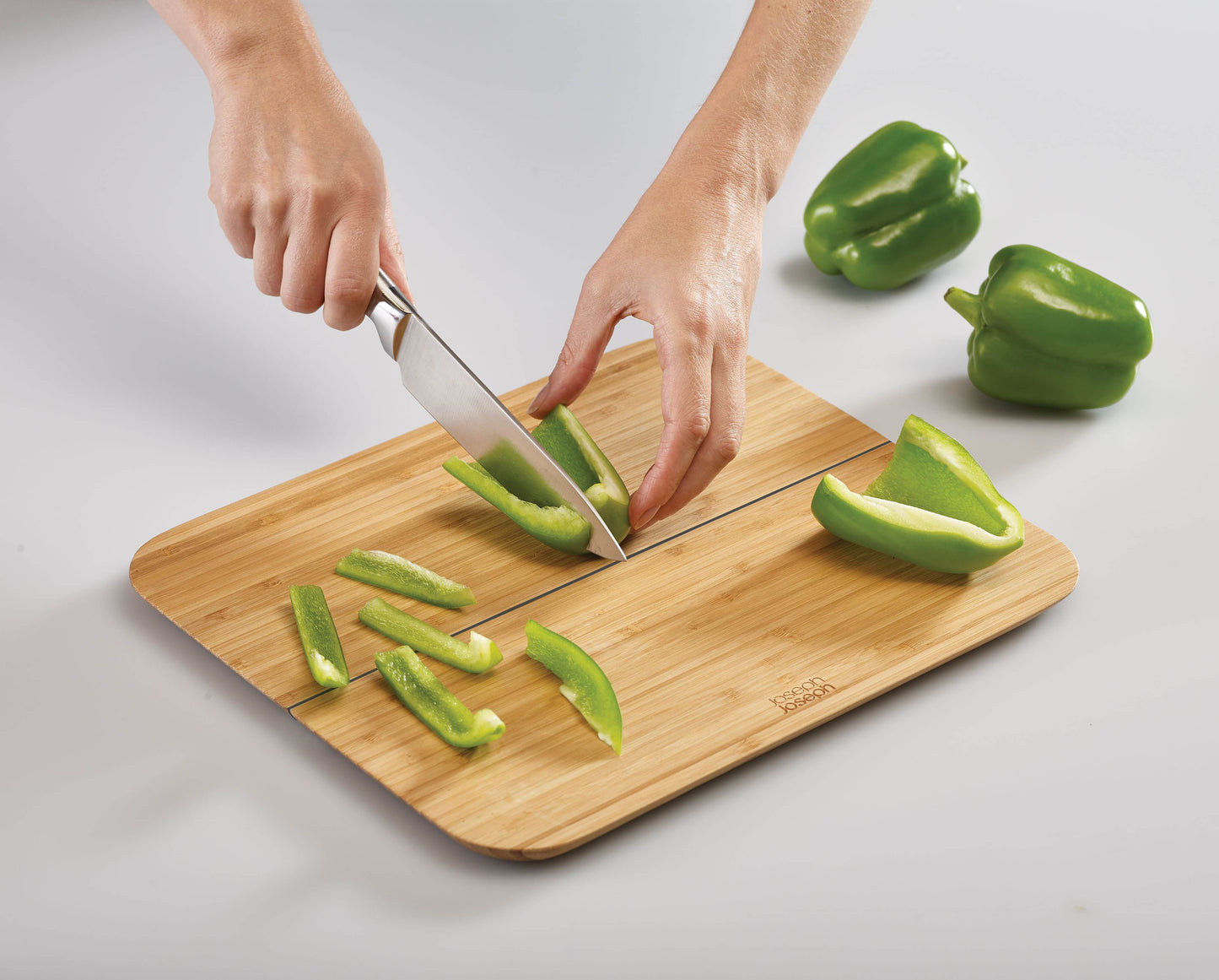Chop2Pot™ Bamboo Pliable Cutting Board for Easy Food Prep